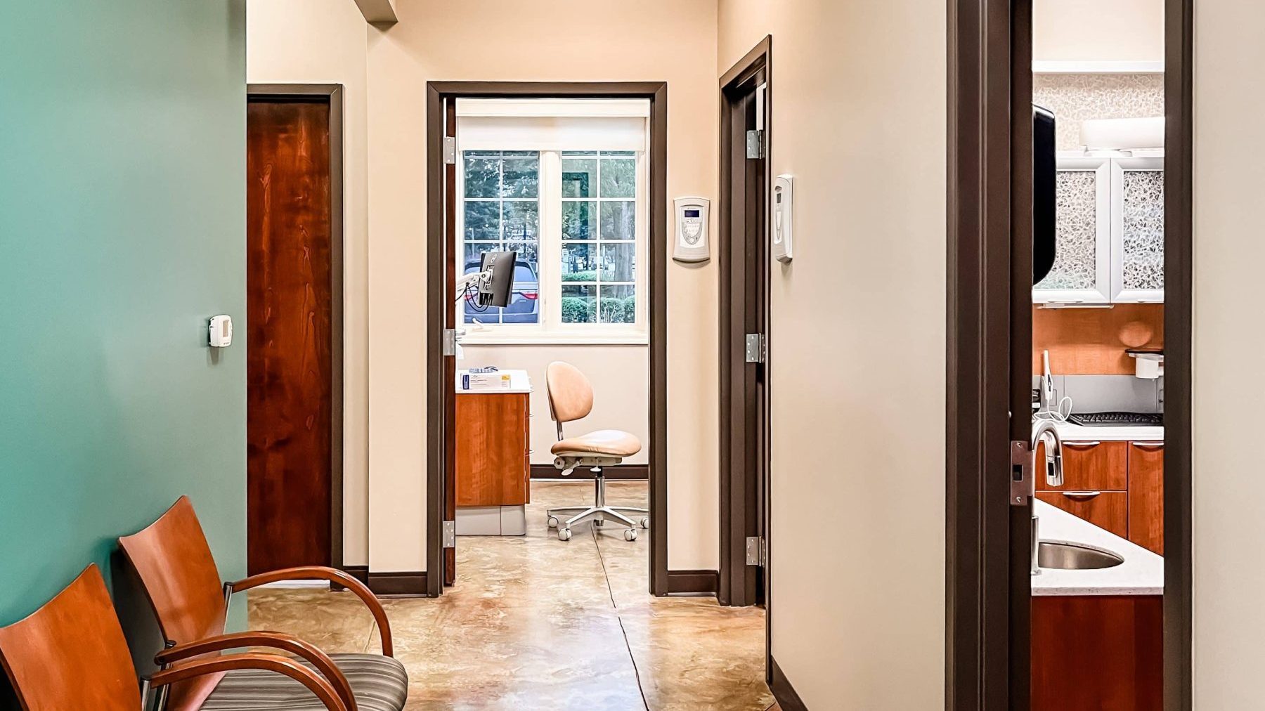 interior of serenity creek dental care in noblesville indiana hallway to exam room