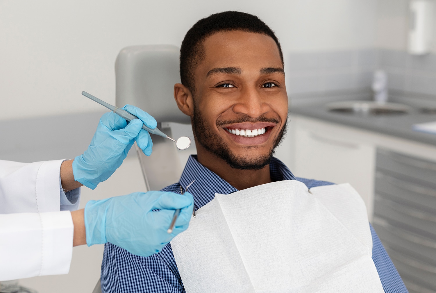 man smiling during dental smile design appointment at serenity creek dental care
